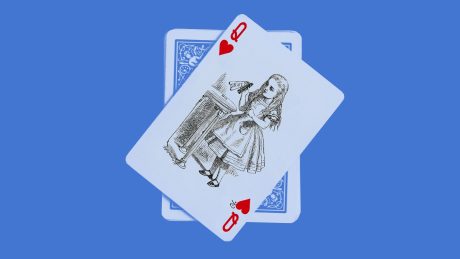 Drawing of Alice in Wonderland holding a 'Drink Me' bottle on a playing card, the Queen of Hearts. Blue background.