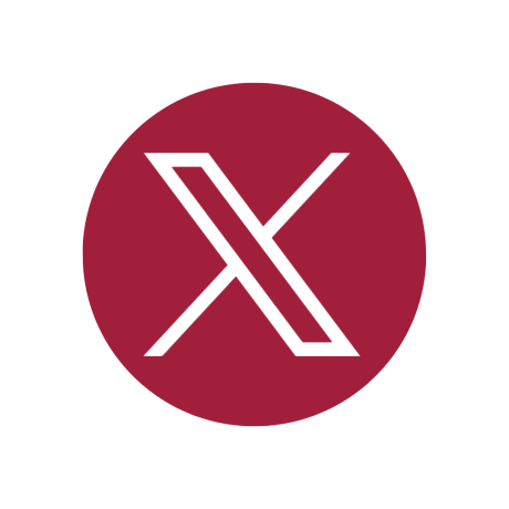 Burgundy circle with white 'X' logo
