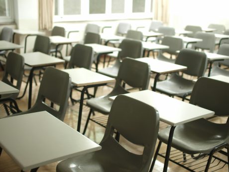 a room full of chairs and tables